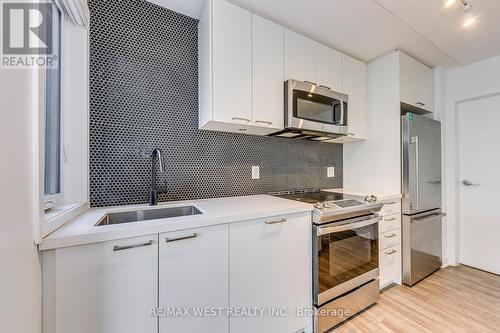 Th11 - 30 Ed Clark Gardens Boulevard, Toronto, ON - Indoor Photo Showing Kitchen With Upgraded Kitchen