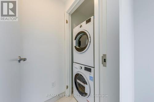 11 - 30 Ed Clark Gardens Boulevard, Toronto, ON - Indoor Photo Showing Laundry Room