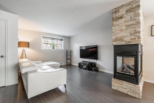 Salon - 1186  - A Rue Des Montérégiennes, Repentigny (Repentigny), QC - Indoor Photo Showing Living Room With Fireplace