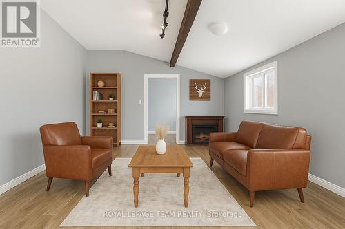 Virtually staged as living room - 160 Burnstown Road, Mcnab/Braeside, ON - Indoor Photo Showing Living Room With Fireplace