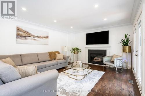 6 Alana Drive, Springwater, ON - Indoor Photo Showing Living Room With Fireplace