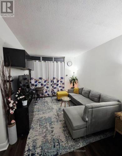 801 - 80 Absolute Avenue, Mississauga, ON - Indoor Photo Showing Living Room