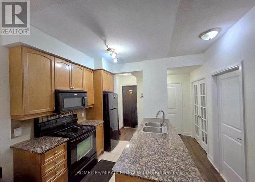801 - 80 Absolute Avenue, Mississauga, ON - Indoor Photo Showing Kitchen With Double Sink