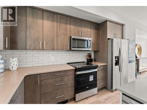 Similar Too - 610 Academy Way Unit# 117, Kelowna, BC - Indoor Photo Showing Kitchen