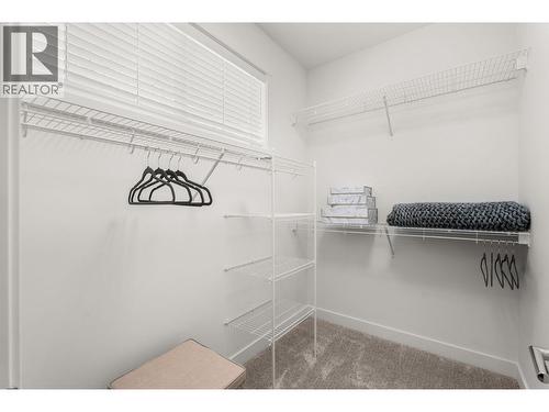 Primary Walk-in Closet - Similar Too - 610 Academy Way Unit# 117, Kelowna, BC - Indoor With Storage