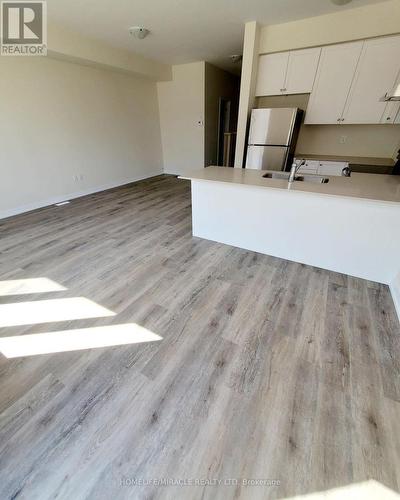 2 - 7789 Kalar Road, Niagara Falls, ON - Indoor Photo Showing Kitchen With Double Sink