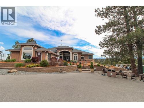 golf course club house - 136 Shadow Mountain Boulevard, Cranbrook, BC - Outdoor With Facade