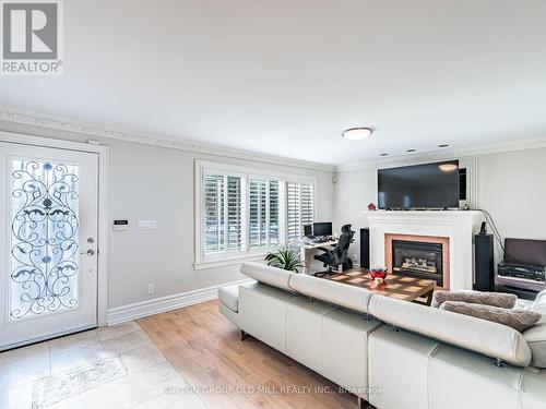 24 Cowley Avenue, Toronto, ON - Indoor Photo Showing Living Room With Fireplace