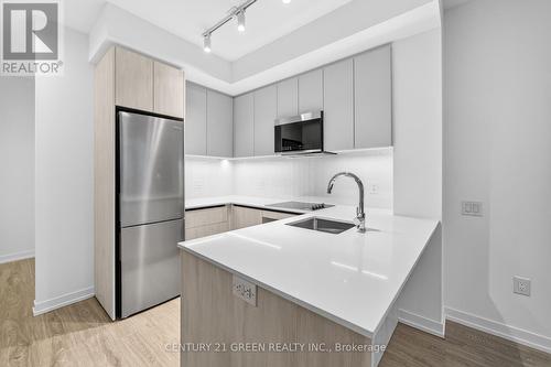 1514 - 2485 Eglinton Avenue W, Mississauga, ON - Indoor Photo Showing Kitchen With Double Sink With Upgraded Kitchen