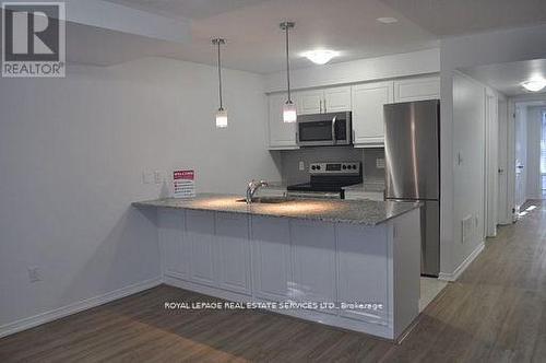 102 - 32 Fieldway Road, Toronto, ON - Indoor Photo Showing Kitchen