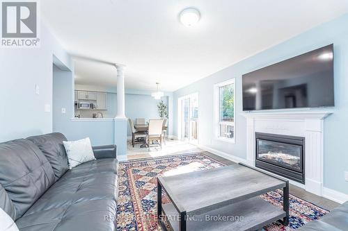 735 Brasswinds Trail, Oshawa, ON - Indoor Photo Showing Living Room With Fireplace