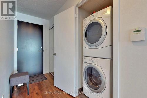 1015 - 135 Village Green Square, Toronto, ON - Indoor Photo Showing Laundry Room