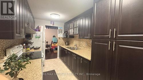 710 - 15 Kensington Road, Brampton, ON - Indoor Photo Showing Kitchen With Double Sink