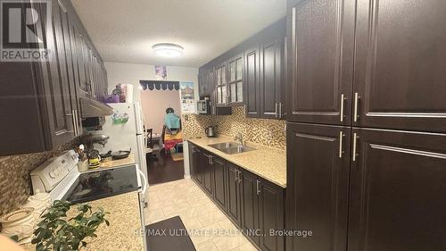 710 - 15 Kensington Road, Brampton, ON - Indoor Photo Showing Kitchen With Double Sink
