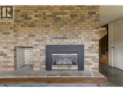 840 Matt Road, Kelowna, BC - Indoor Photo Showing Living Room With Fireplace