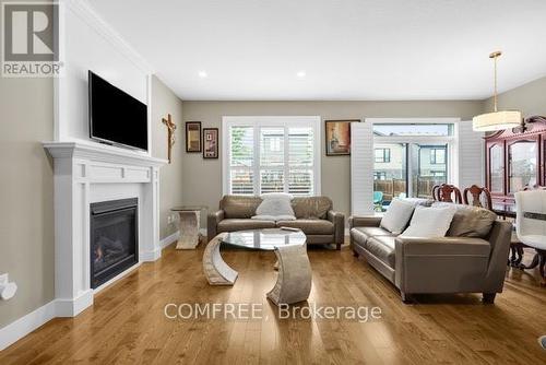 2221 Tribalwood Street, London North (North E), ON - Indoor Photo Showing Living Room With Fireplace