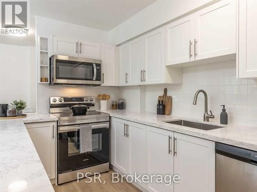 707 - 240 Markland Drive, Toronto, ON - Indoor Photo Showing Kitchen