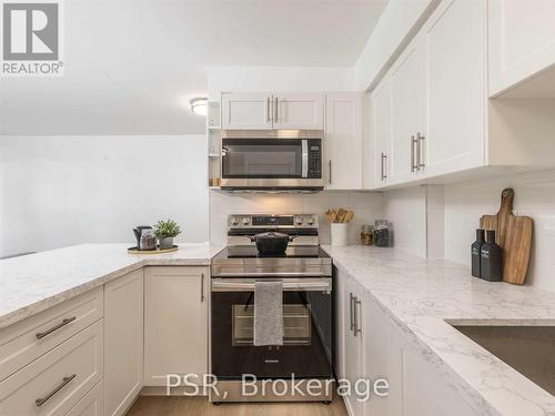 707 - 240 Markland Drive, Toronto, ON - Indoor Photo Showing Kitchen