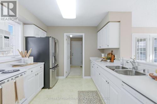 21 Heritage Lane, Clarington (Newcastle), ON - Indoor Photo Showing Kitchen With Double Sink