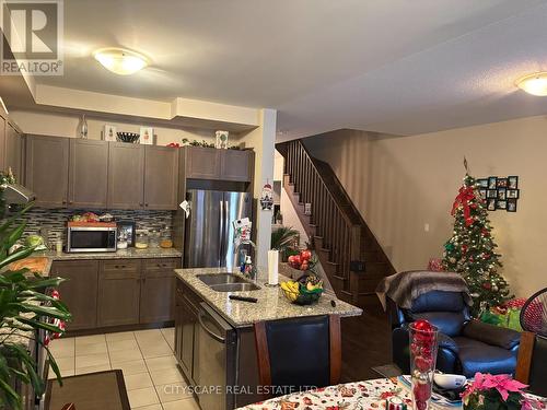87 Sonoma Valley Crescent E, Hamilton, ON - Indoor Photo Showing Kitchen With Double Sink