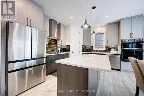 1895 Fountain Grass Drive, London South (South B), ON - Indoor Photo Showing Kitchen With Upgraded Kitchen