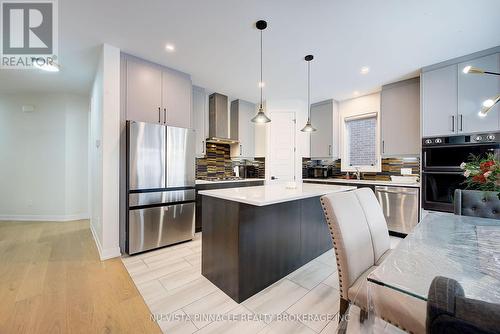 1895 Fountain Grass Drive, London South (South B), ON - Indoor Photo Showing Kitchen With Upgraded Kitchen