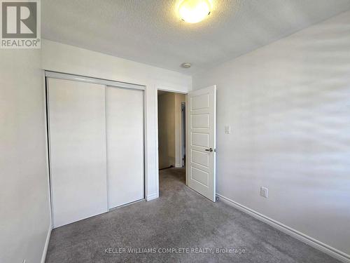 angle on bedroom 2 - 518 Buckeye Court, Milton, ON - Indoor Photo Showing Other Room