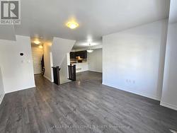 living room looking toward kitchen - 