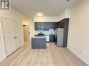 103 - 3006 William Cutmore Boulevard, Oakville, ON  - Indoor Photo Showing Kitchen With Stainless Steel Kitchen 
