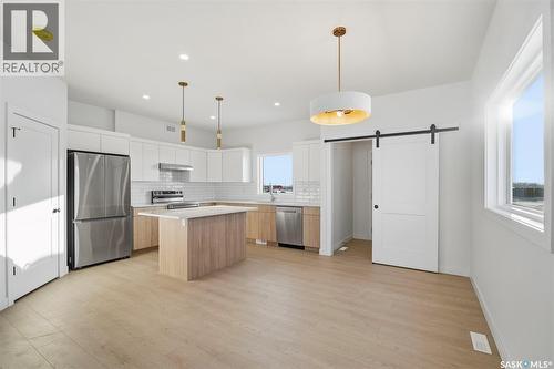 1408 Besnard Drive, Martensville, SK - Indoor Photo Showing Kitchen With Stainless Steel Kitchen With Upgraded Kitchen