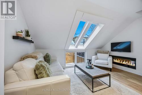 121 Montgomery Avenue, Toronto, ON - Indoor Photo Showing Living Room With Fireplace
