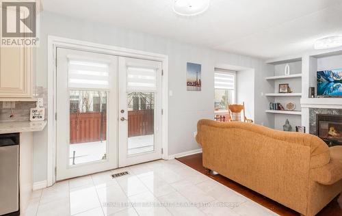5050 Bunton Crescent, Burlington, ON - Indoor Photo Showing Other Room With Fireplace