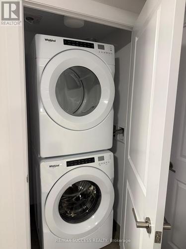 1205 - 3240 William Coltson Ave Avenue, Oakville, ON - Indoor Photo Showing Laundry Room
