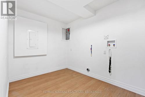 Each unit with it's own laundry hook ups. - 396 Fairview Road, Fort Erie (Crescent Park), ON - Indoor Photo Showing Other Room