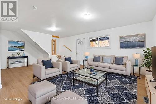 Virtually staged. - 396 Fairview Road, Fort Erie (Crescent Park), ON - Indoor Photo Showing Living Room