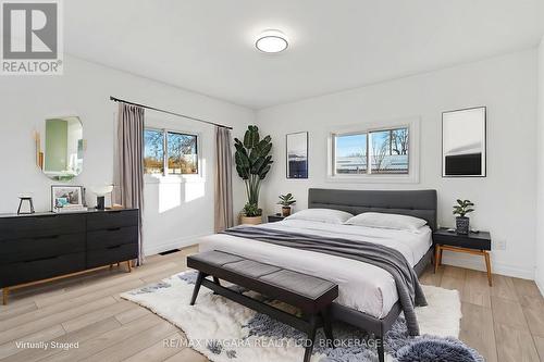 Virtually staged back unit bedroom 2. - 396 Fairview Road, Fort Erie (Crescent Park), ON - Indoor Photo Showing Bedroom