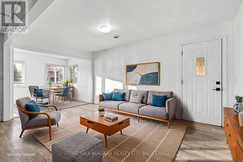 Virtually staged. - 396 Fairview Road, Fort Erie (Crescent Park), ON - Indoor Photo Showing Living Room