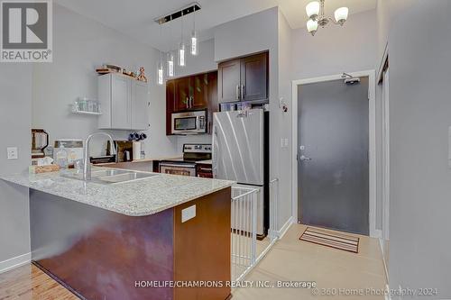 709 - 4070 Confederation Parkway, Mississauga, ON - Indoor Photo Showing Kitchen With Double Sink