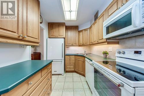 405 - 240 Scarlett Road, Toronto, ON - Indoor Photo Showing Kitchen With Double Sink