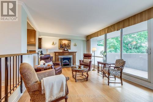 405 - 240 Scarlett Road, Toronto, ON - Indoor Photo Showing Living Room With Fireplace