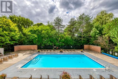 405 - 240 Scarlett Road, Toronto, ON - Outdoor With In Ground Pool With Backyard