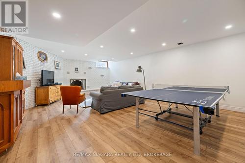 Family room with wood burning fireplace - 340 Roland Road, Pelham (North Pelham), ON 