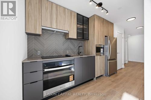 710 - 1037 The Queensway, Toronto, ON - Indoor Photo Showing Kitchen With Stainless Steel Kitchen