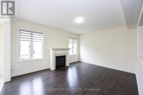 Upper - 24 Dotchson Avenue, Caledon, ON - Indoor Photo Showing Other Room With Fireplace