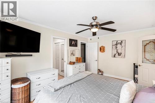 Bedroom with ornamental molding and ceiling fan - 7087 Rainham Road, Dunnville, ON - Indoor Photo Showing Bedroom