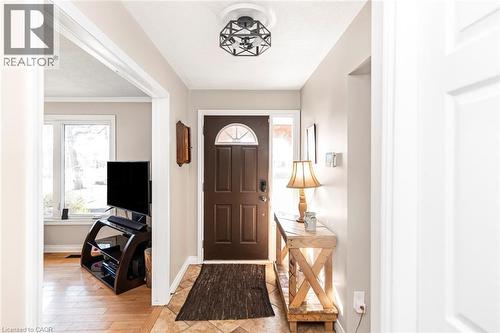 Entryway with plenty of natural light, light wood-style floors, and a textured ceiling - 7087 Rainham Road, Dunnville, ON - Indoor Photo Showing Other Room