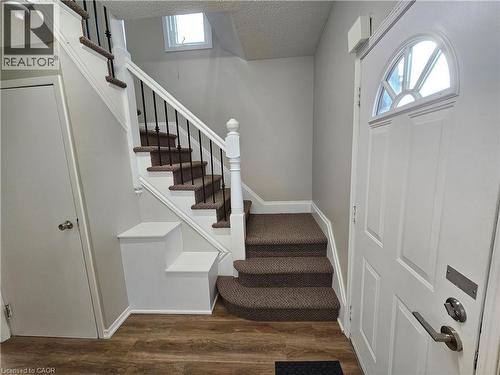 another view showing front door and stairs to second floor - 100 E Lancaster Street E, Kitchener, ON 