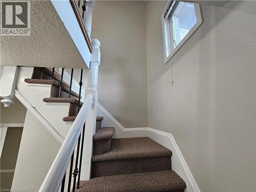 another view of stairs with bright window on stairs - 100 Lancaster Street E, Kitchener, ON 