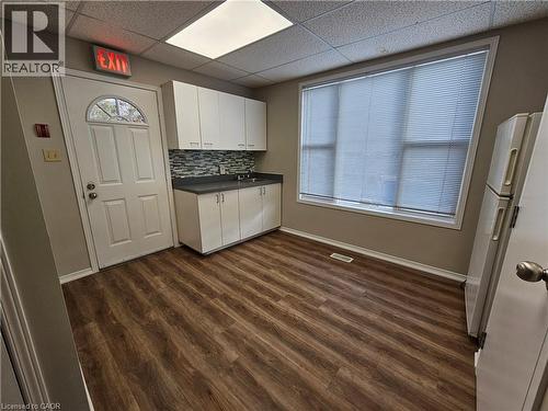 Kitchen with fride on main floor - 100 E Lancaster Street E, Kitchener, ON 