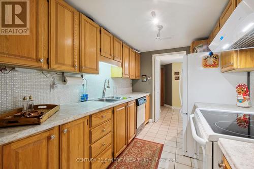 Lot of cupboards and drawers - 104 - 295 Gilmour Street, Ottawa, ON - Indoor Photo Showing Kitchen With Double Sink